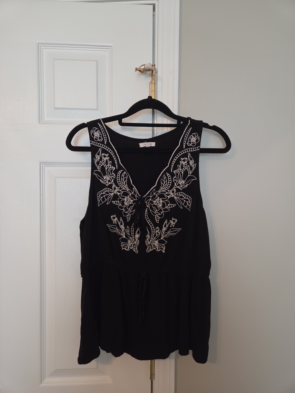 Maurices Black Sleeveless Top with White Embroidered Detail